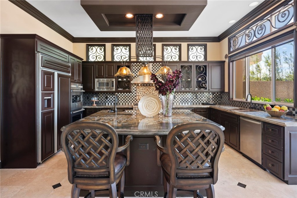 35 Silver Pine Drive Newport Coast, CA 92657 - Photo 15 of 31 a view of a dining room with furniture and window