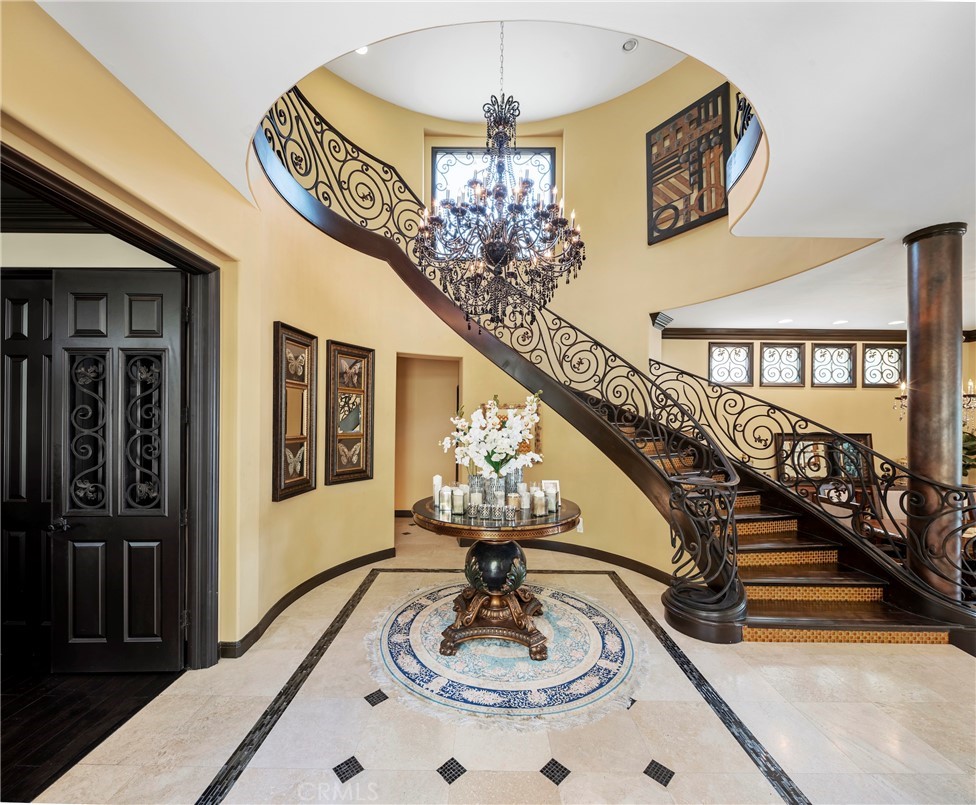 35 Silver Pine Drive Newport Coast, CA 92657 - Photo 7 of 31 a very nice looking dining room with wooden floor a chandelier