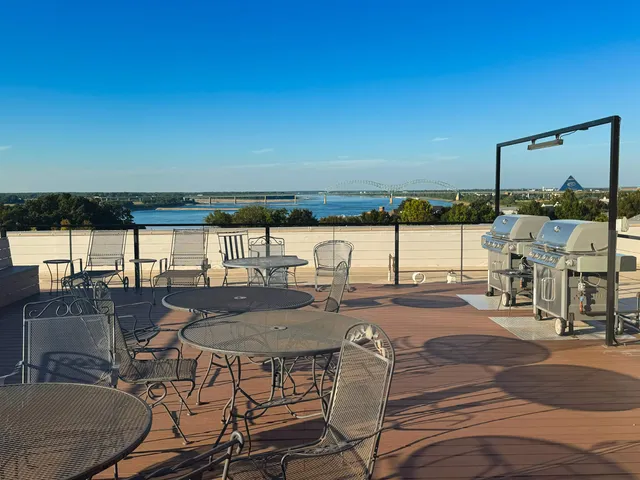 a view of a patio with swimming pool