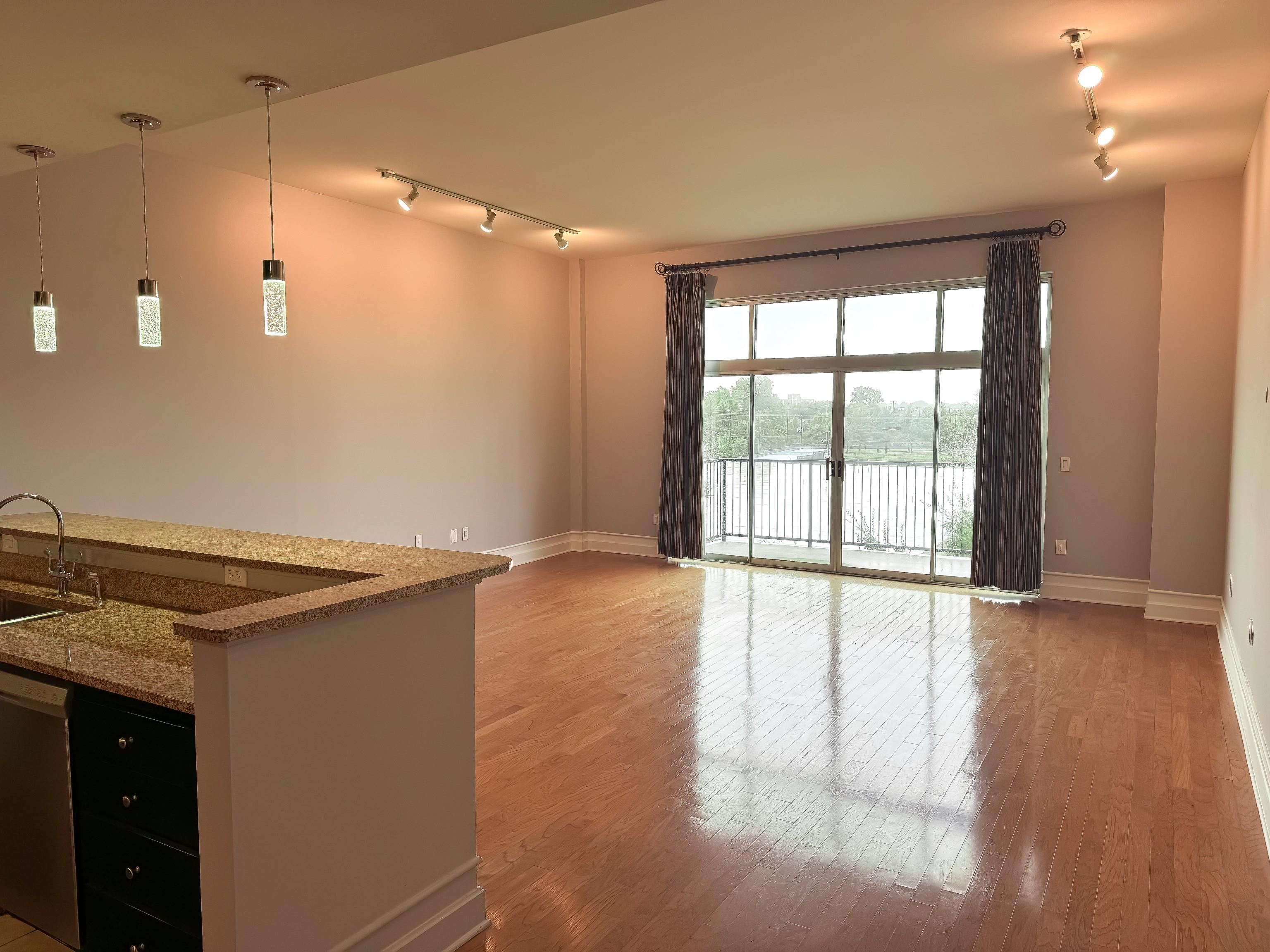 648 Riverside Drive, Unit 309 Memphis, TN 38103 - Photo 10 of 30 a view of an empty room with a window