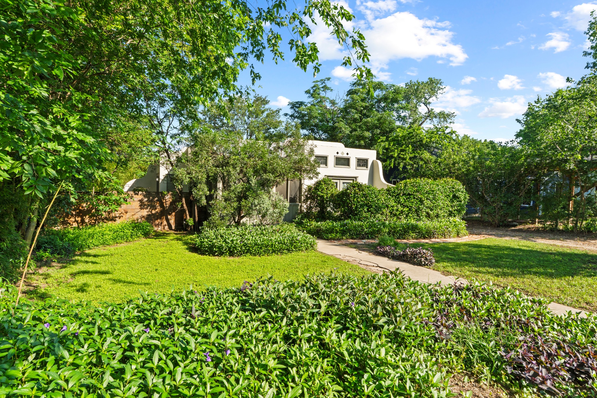 4802 Rowena Avenue Austin, TX 78751 - Photo 35 of 37 Southwestern-style stucco exterior.