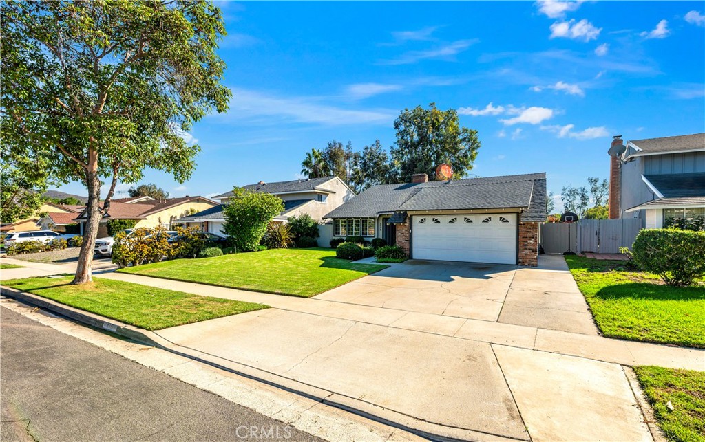 475 Termino Avenue Corona, CA 92879 - Photo 2 of 35 a view of a house with a yard