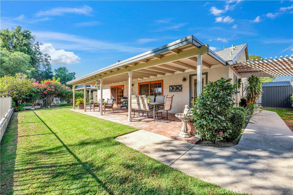 475 Termino Avenue Corona, CA 92879 - Photo 26 of 35 a view of a house with backyard porch and sitting area