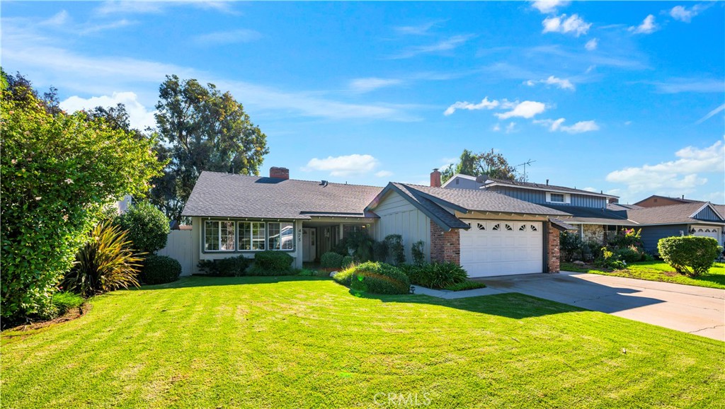 475 Termino Avenue Corona, CA 92879 - Photo 3 of 35 a front view of a house with a yard
