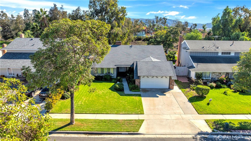 475 Termino Avenue Corona, CA 92879 - Photo 4 of 35 a view of a house with a yard