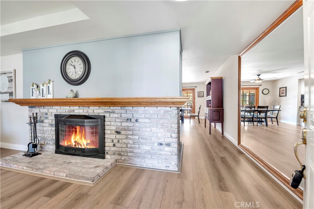 475 Termino Avenue Corona, CA 92879 - Photo 7 of 35 a view of dining room with furniture and fireplace