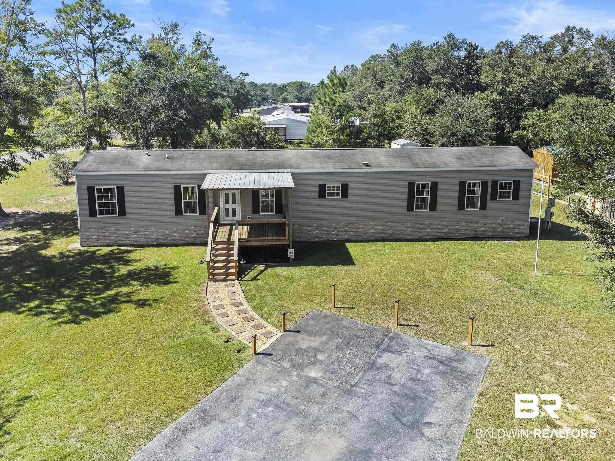 6870 Cecilia Court Theodore, AL 36582 - Photo 63 of 83 Manufactured / mobile home with a front lawn