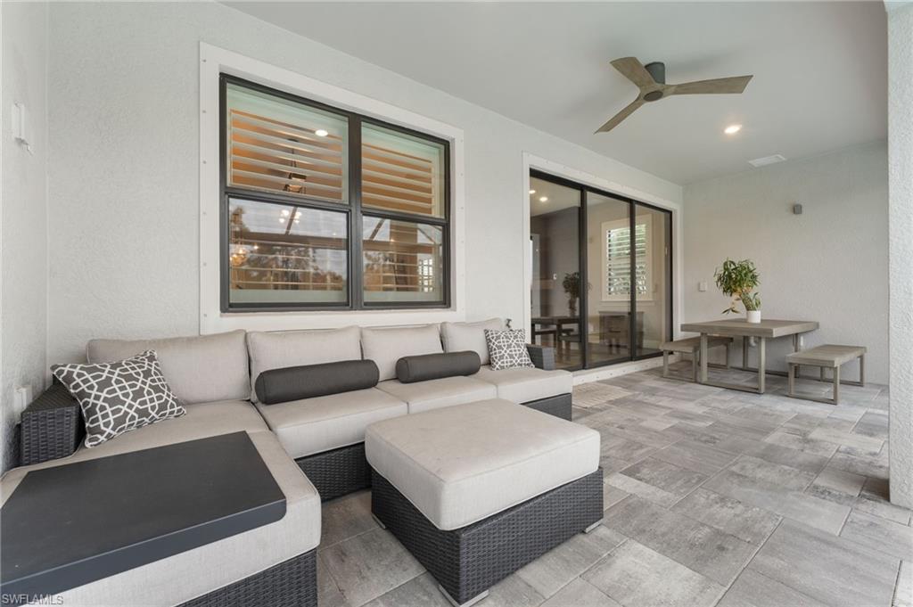 14240 Moonlit Way Estero, FL 33928 - Photo 26 of 50 a living room with furniture and window