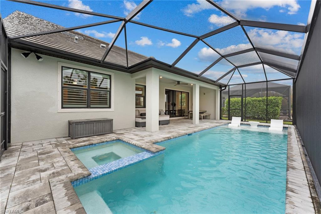 14240 Moonlit Way Estero, FL 33928 - Photo 32 of 50 a front view of house with yard