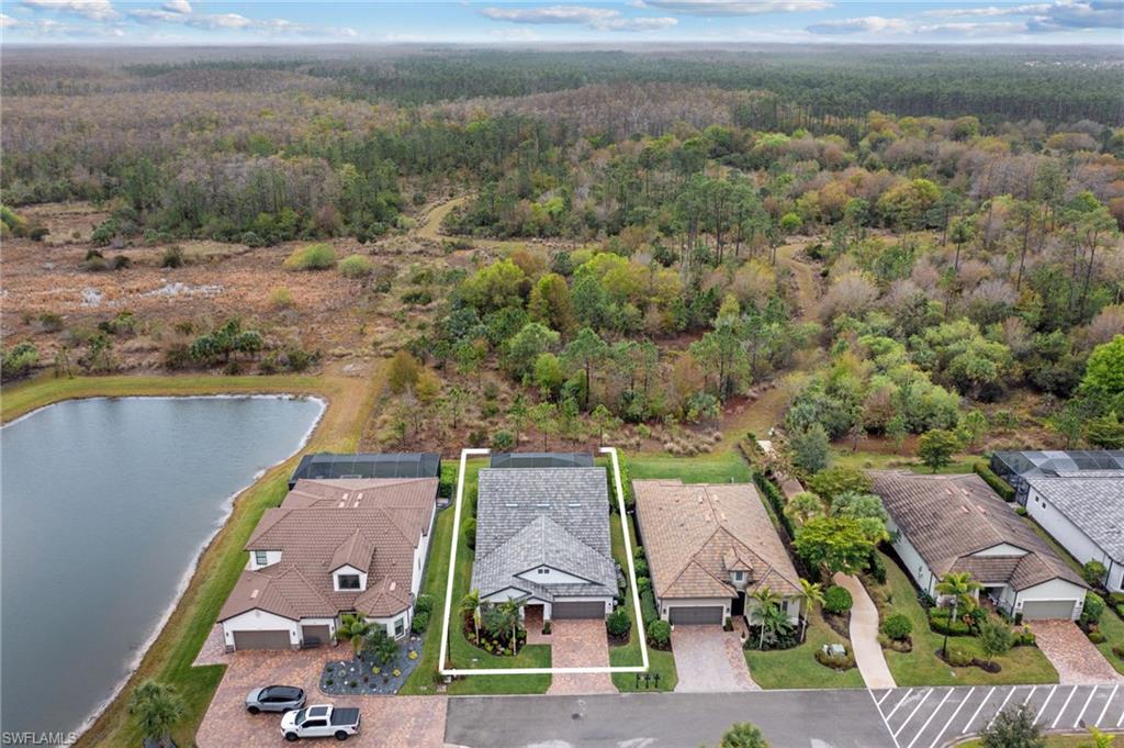 14240 Moonlit Way Estero, FL 33928 - Photo 42 of 50 an aerial view of a house with a lake view