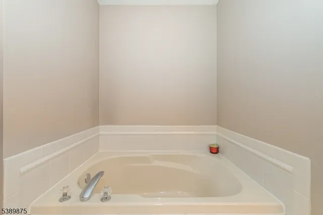 a bathroom with bathtub