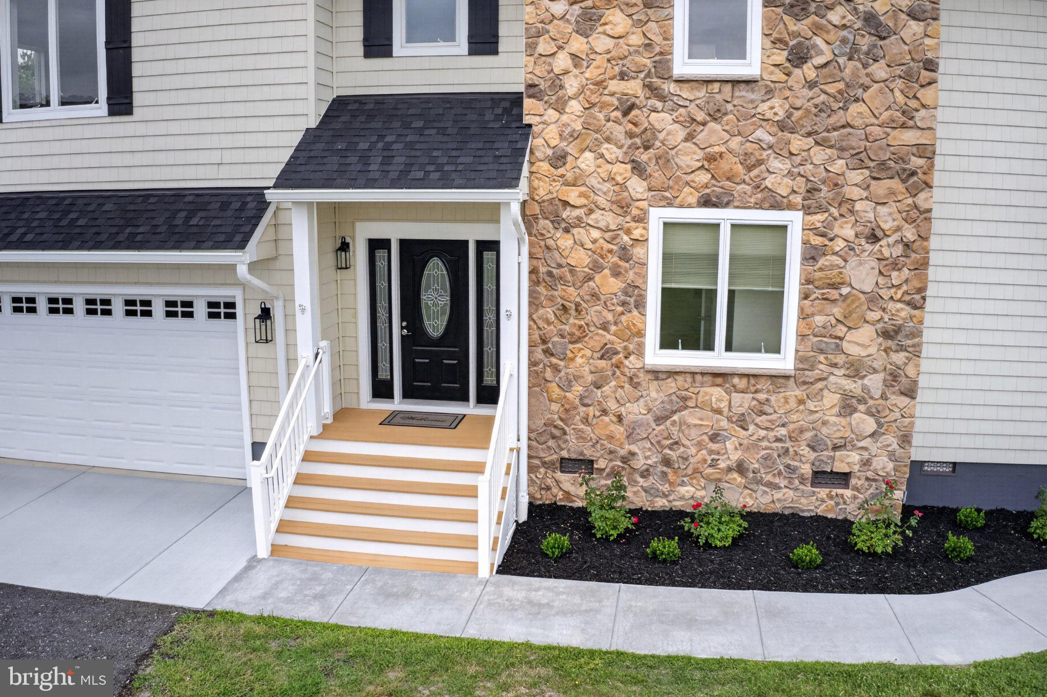 34029 Peppers Corner Road Millville, DE 19967 - Photo 13 of 101 Charming entrance with stone accents.