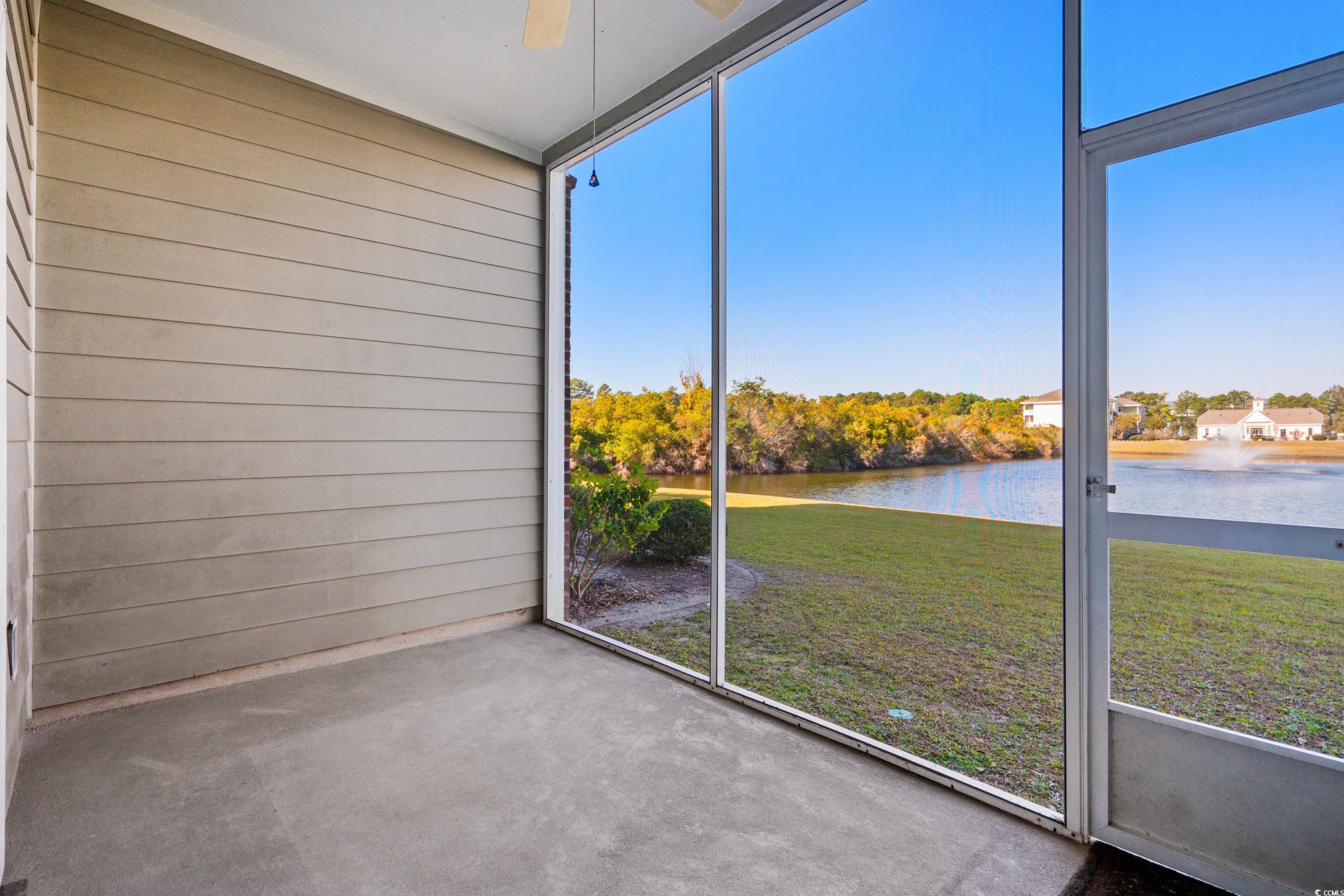 336 Kiskadee Loop, Unit B Conway, SC 29526 - Photo 20 of 40 Unfurnished sunroom featuring a water view and ceiling fan