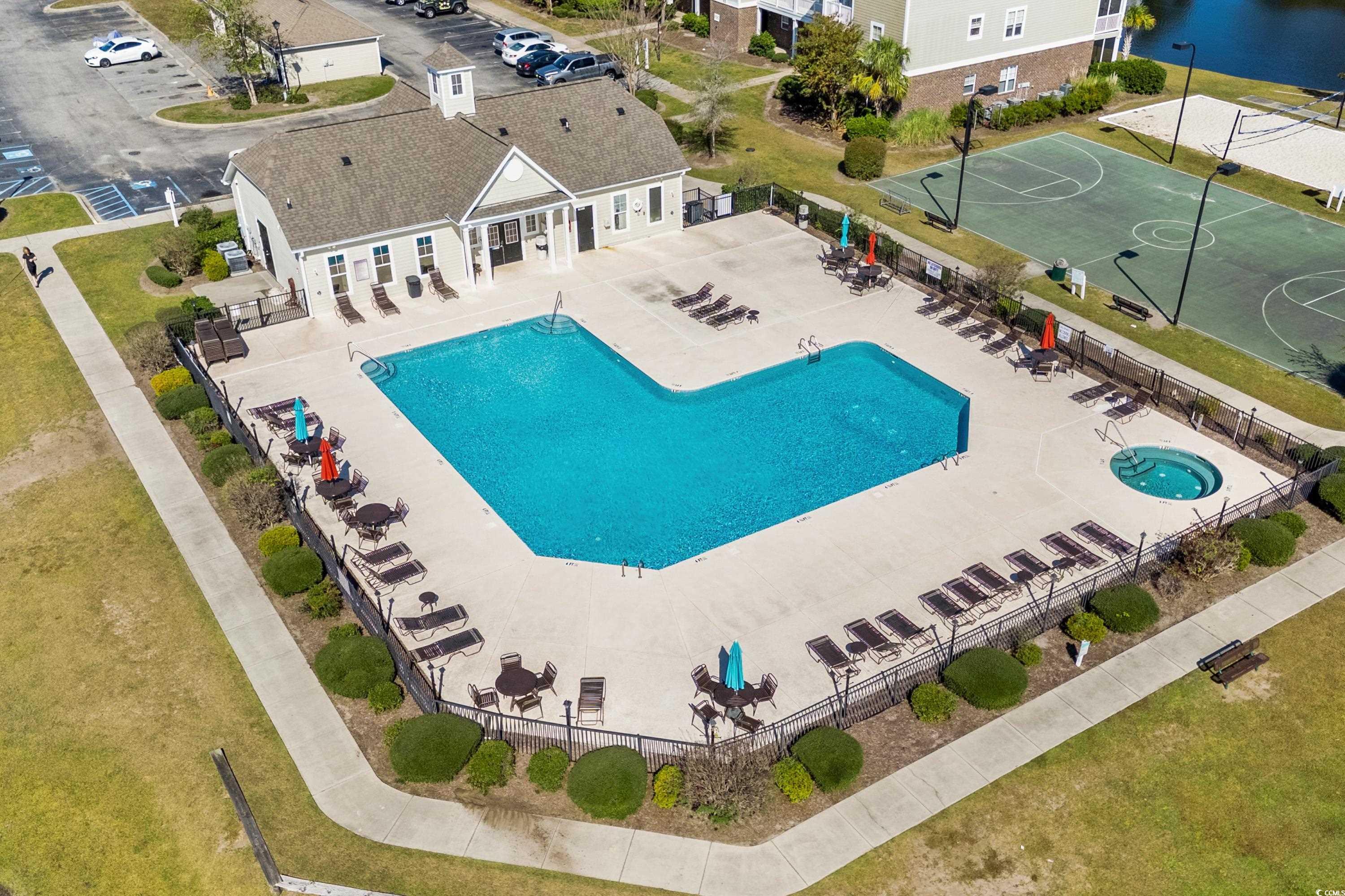 336 Kiskadee Loop, Unit B Conway, SC 29526 - Photo 35 of 40 View of pool with basketball court and a patio