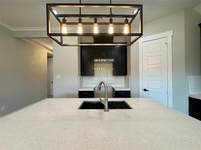 a bedroom with a bed and a mirror