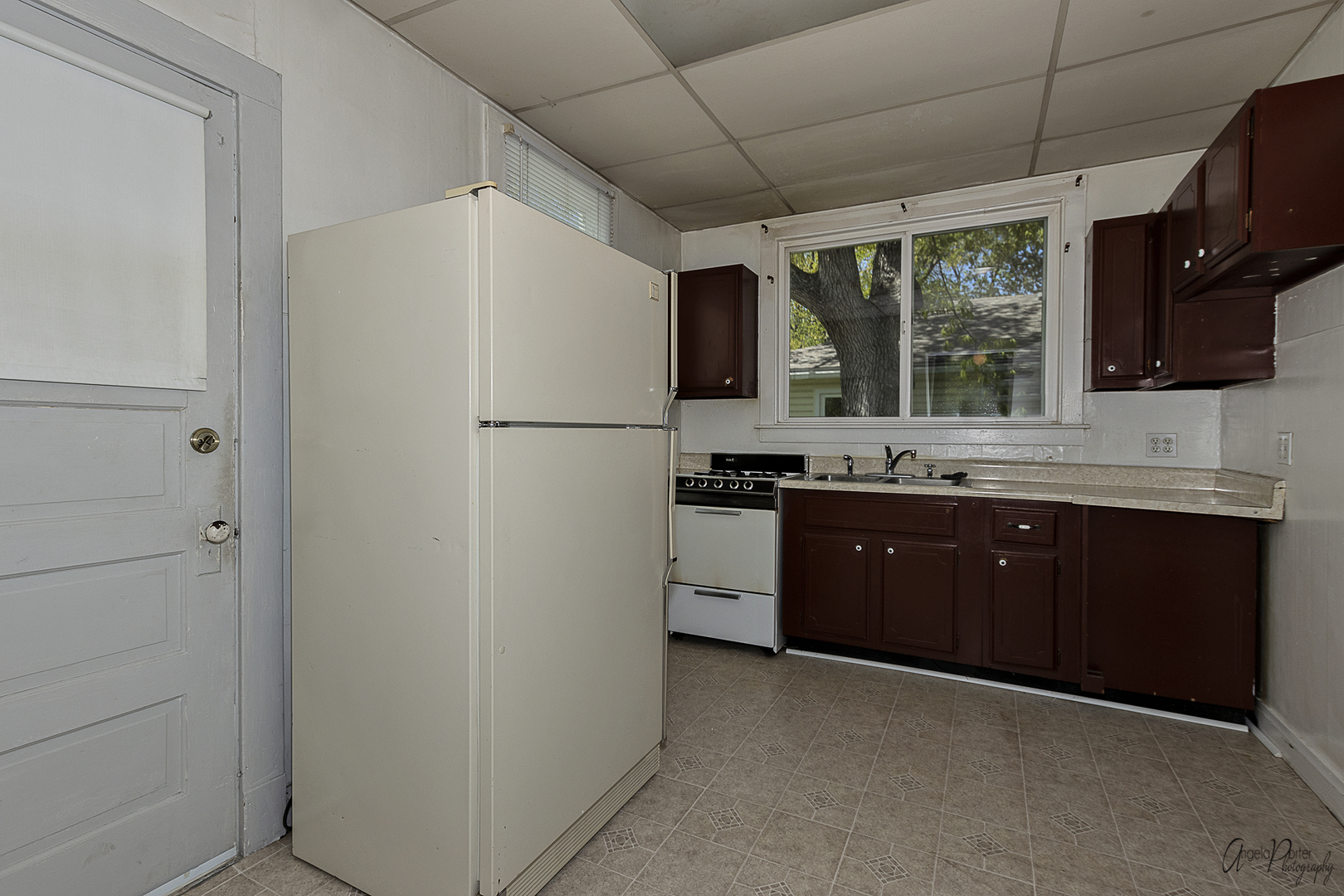 35674 North Wilson Road Ingleside, IL 60041 - Photo 11 of 18 a kitchen with a refrigerator a sink and cabinets
