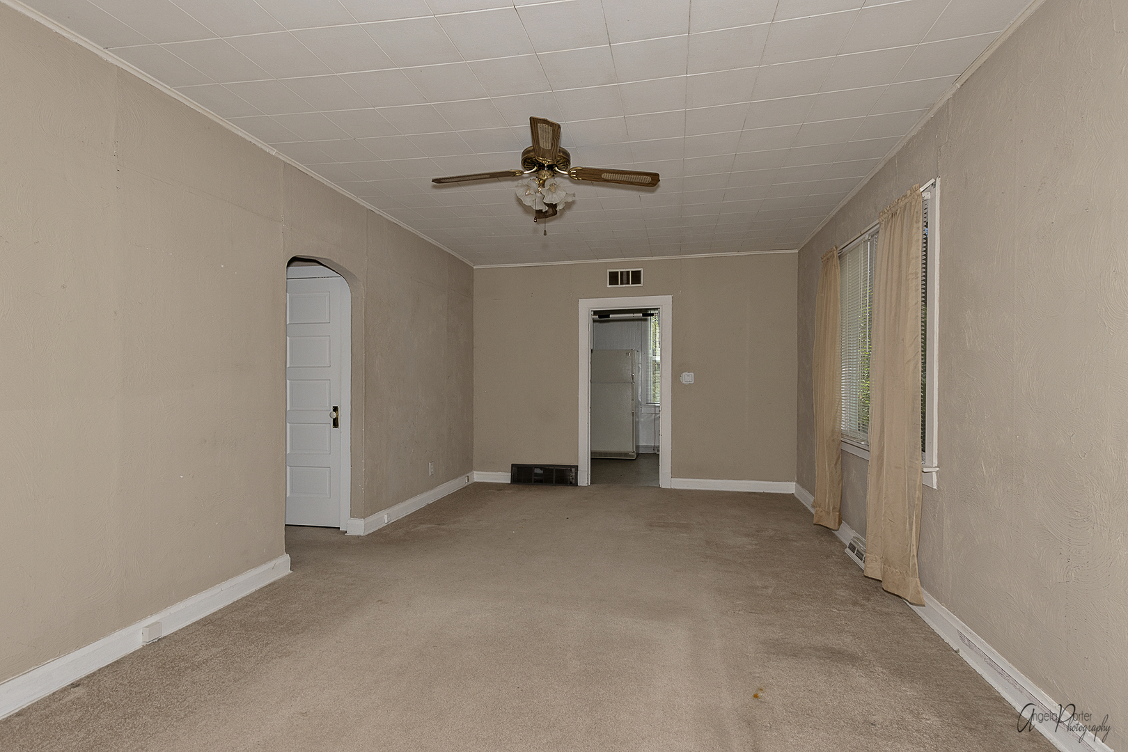 35674 North Wilson Road Ingleside, IL 60041 - Photo 4 of 18 an empty room with chandelier fan and windows