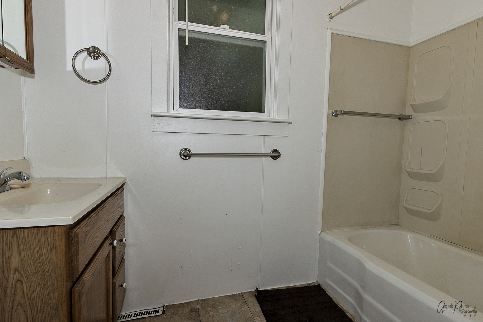 35674 North Wilson Road Ingleside, IL 60041 - Photo 9 of 18 a bathroom with a tub sink and mirror