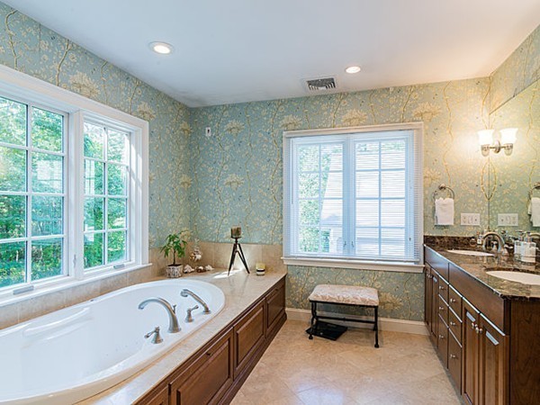 4 Cedar Street Natick, MA 01760 - Photo 14 of 21 a bathroom with a tub a sink and a window