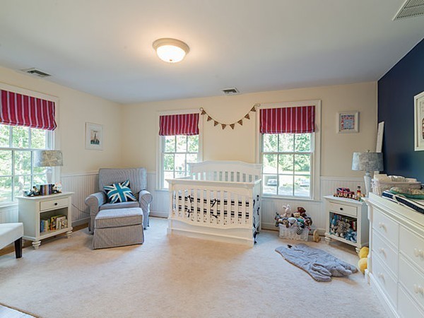 4 Cedar Street Natick, MA 01760 - Photo 15 of 21 a living room with furniture and a flat screen tv