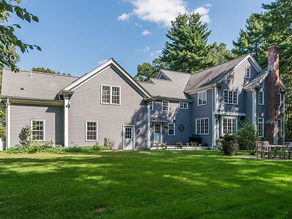 4 Cedar Street Natick, MA 01760 - Photo 19 of 21 a front view of house with yard and green space