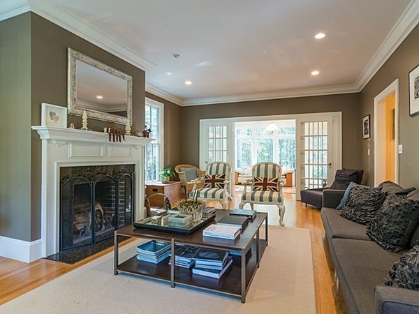 4 Cedar Street Natick, MA 01760 - Photo 10 of 21 a living room with furniture fireplace and large windows
