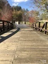 a view of a lake with a building in the background