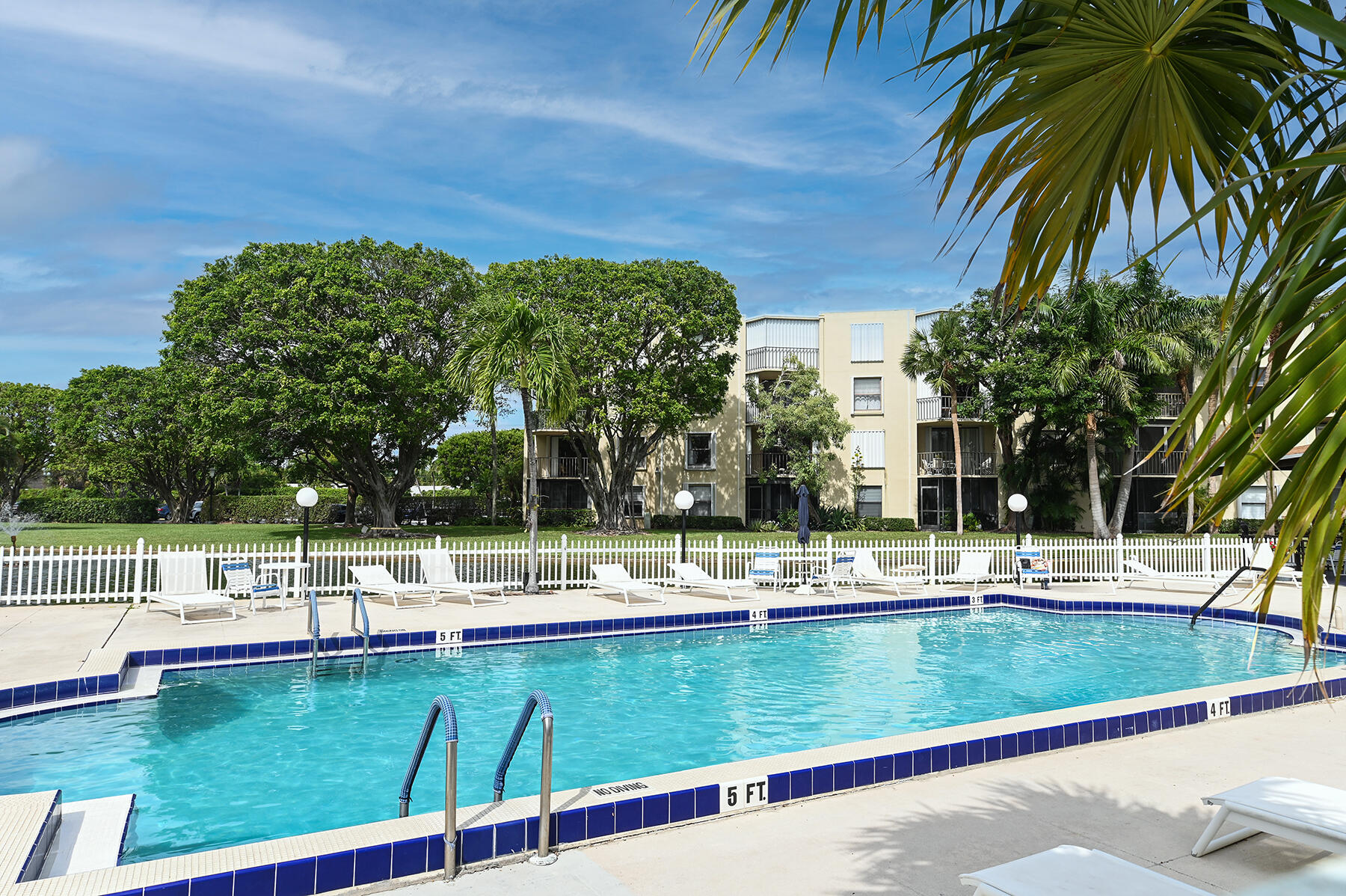 896 North Federal Highway, Unit 124 Lantana, FL 33462 - Photo 11 of 11 a view of a swimming pool with a garden