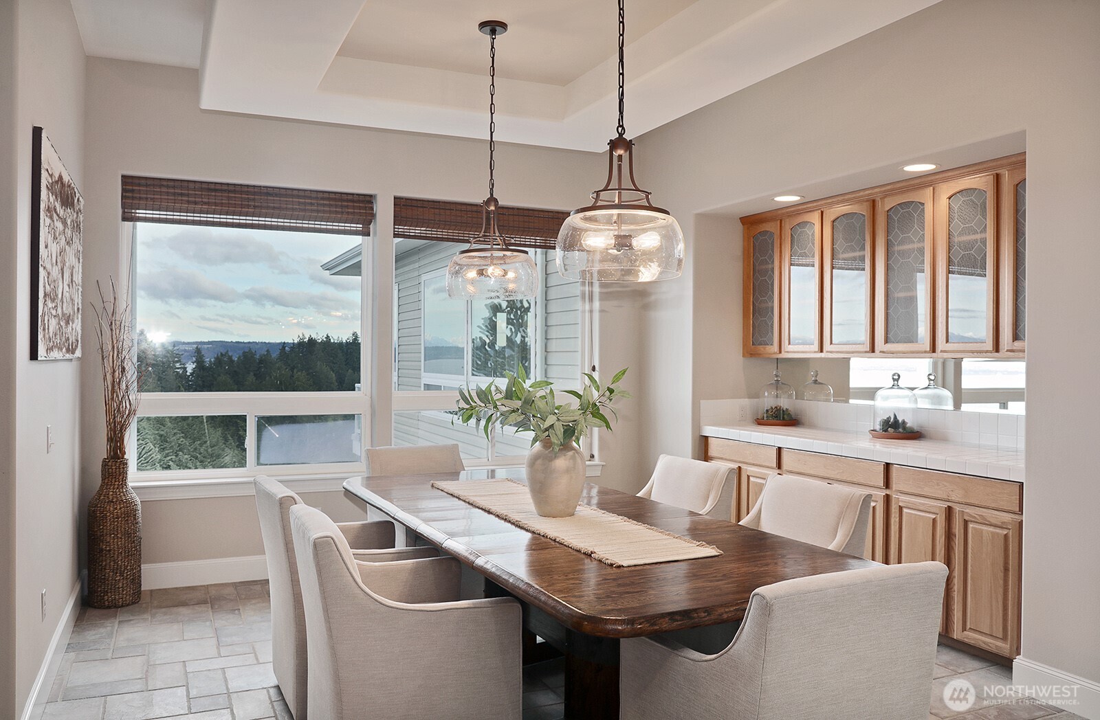 4694 Wrightsman Place Clinton, WA 98236 - Photo 11 of 38 a view of a dining room with furniture window and outside view
