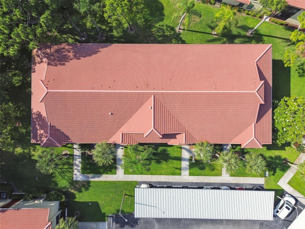 1801 East Lake Road South, Unit 3A Palm Harbor, FL 34685 - Photo 55 of 56 an aerial view of a house