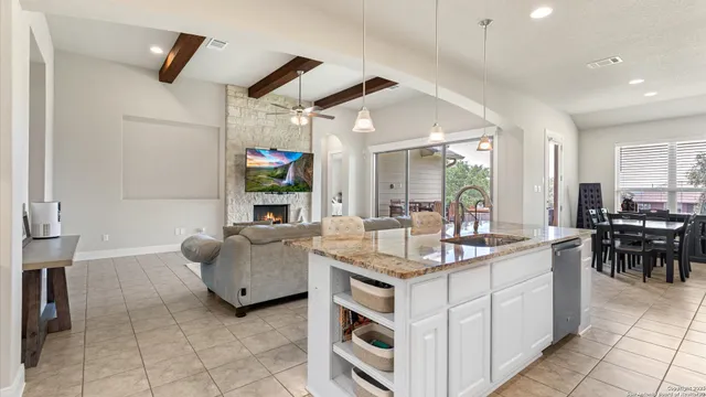 a living room with furniture and a table