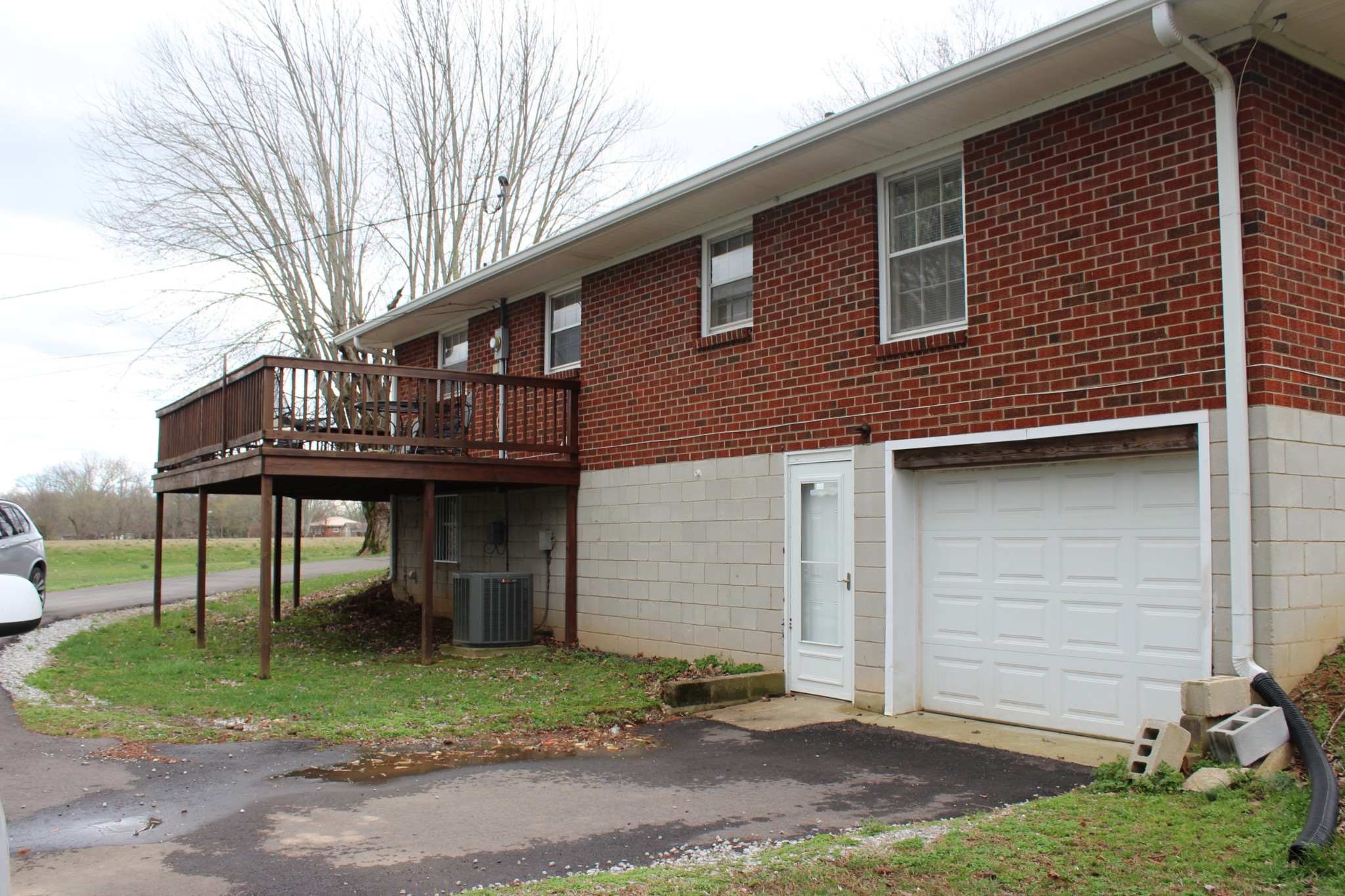 317 Pitt Lane Springfield, TN 37172 - Photo 21 of 22 a front view of a house with a yard and garage
