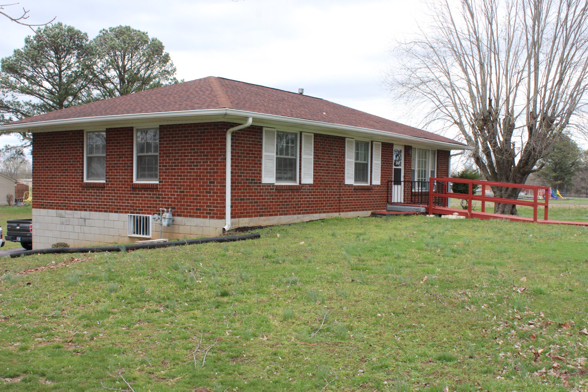 317 Pitt Lane Springfield, TN 37172 - Photo 4 of 22 a front view of a house with a garden