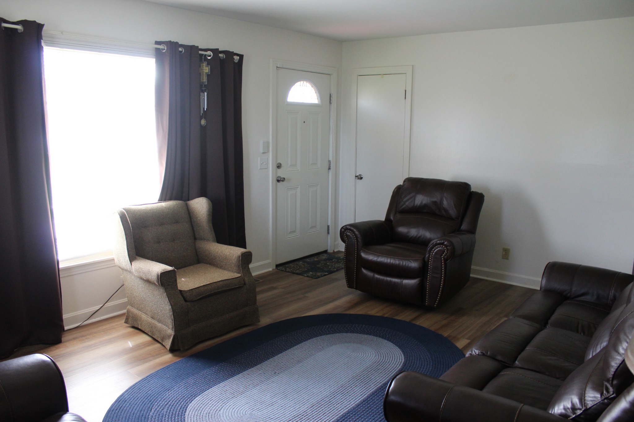 317 Pitt Lane Springfield, TN 37172 - Photo 6 of 22 a living room with furniture and a chair