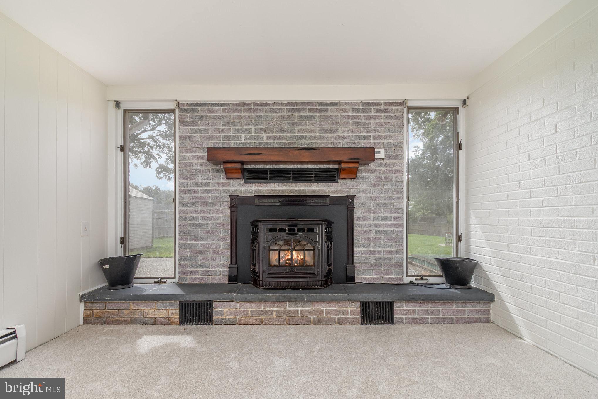 2507 Jerusalem Road Joppa, MD 21085 - Photo 14 of 50 a living room with a fireplace