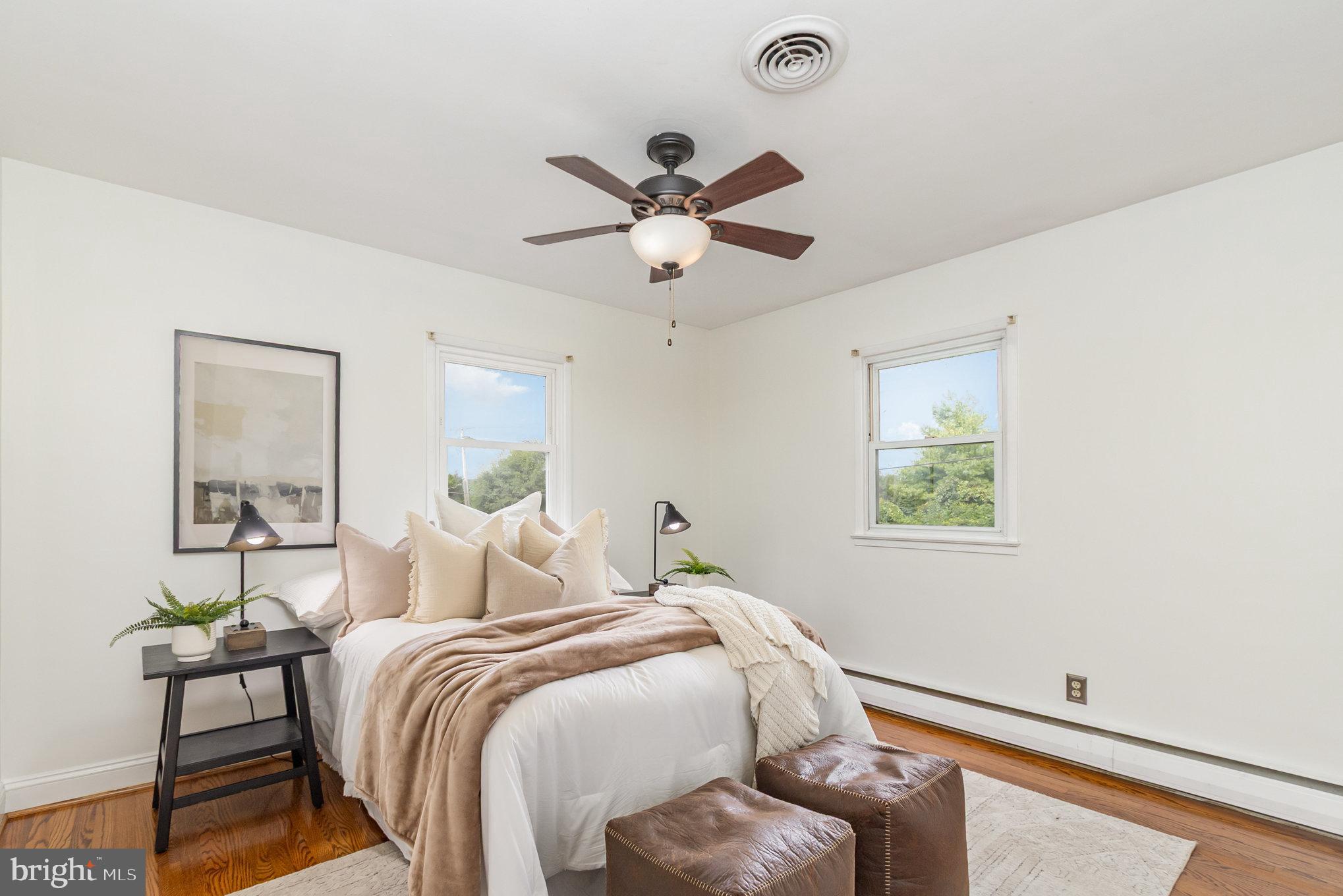 2507 Jerusalem Road Joppa, MD 21085 - Photo 20 of 50 a bedroom with a bed and a chandelier