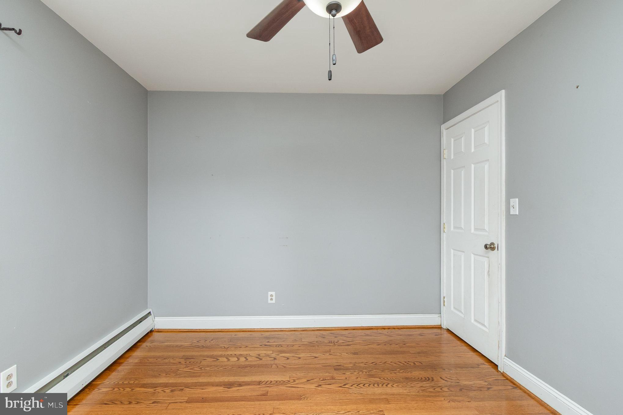 2507 Jerusalem Road Joppa, MD 21085 - Photo 24 of 50 an empty room with ceiling fan and window