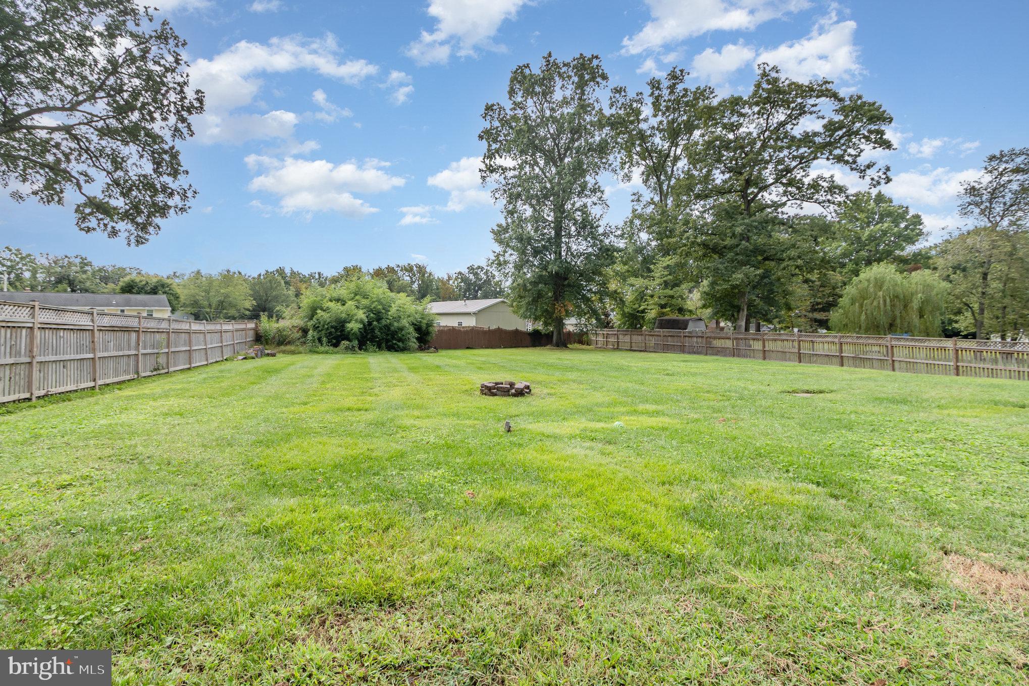 2507 Jerusalem Road Joppa, MD 21085 - Photo 37 of 50 a backyard of a house with lots of green space