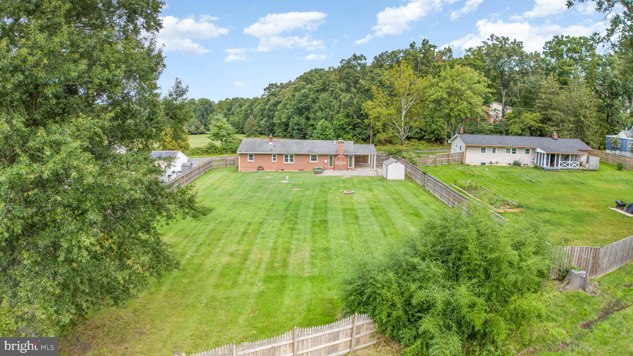 2507 Jerusalem Road Joppa, MD 21085 - Photo 48 of 50 a backyard of a house with lots of green space