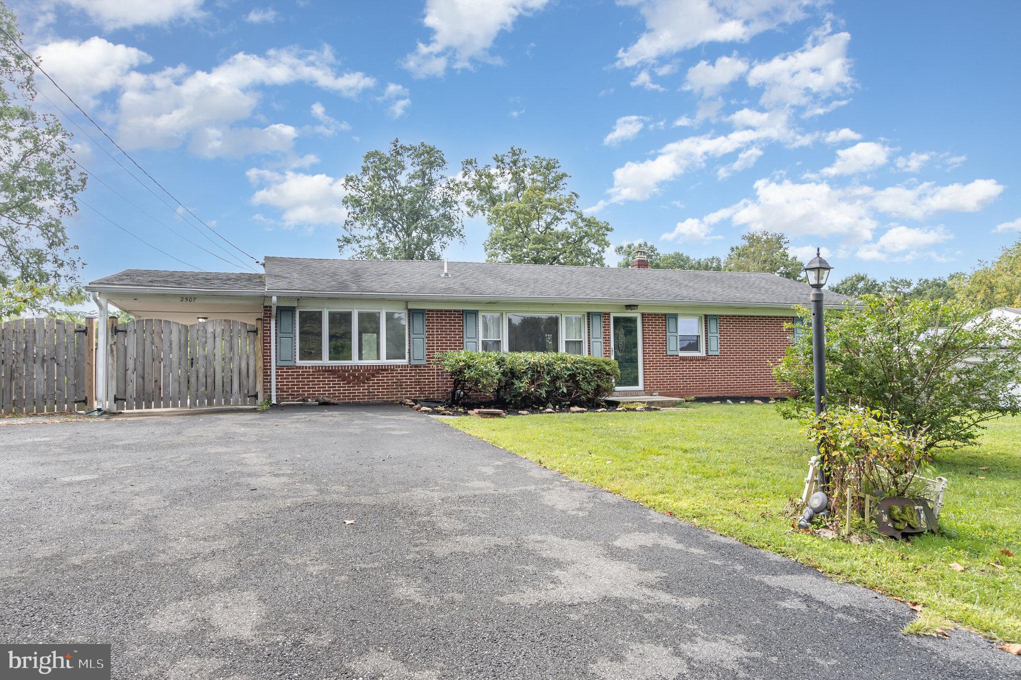 2507 Jerusalem Road Joppa, MD 21085 - Photo 5 of 50 front view of a house with a yard