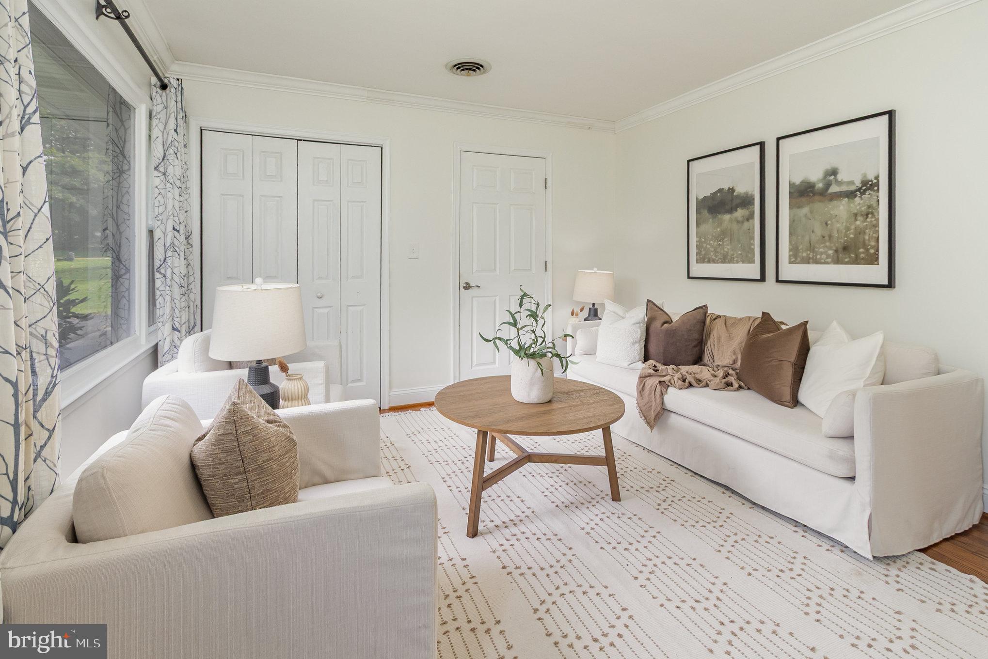 2507 Jerusalem Road Joppa, MD 21085 - Photo 9 of 50 a living room with furniture and a painting on the wall