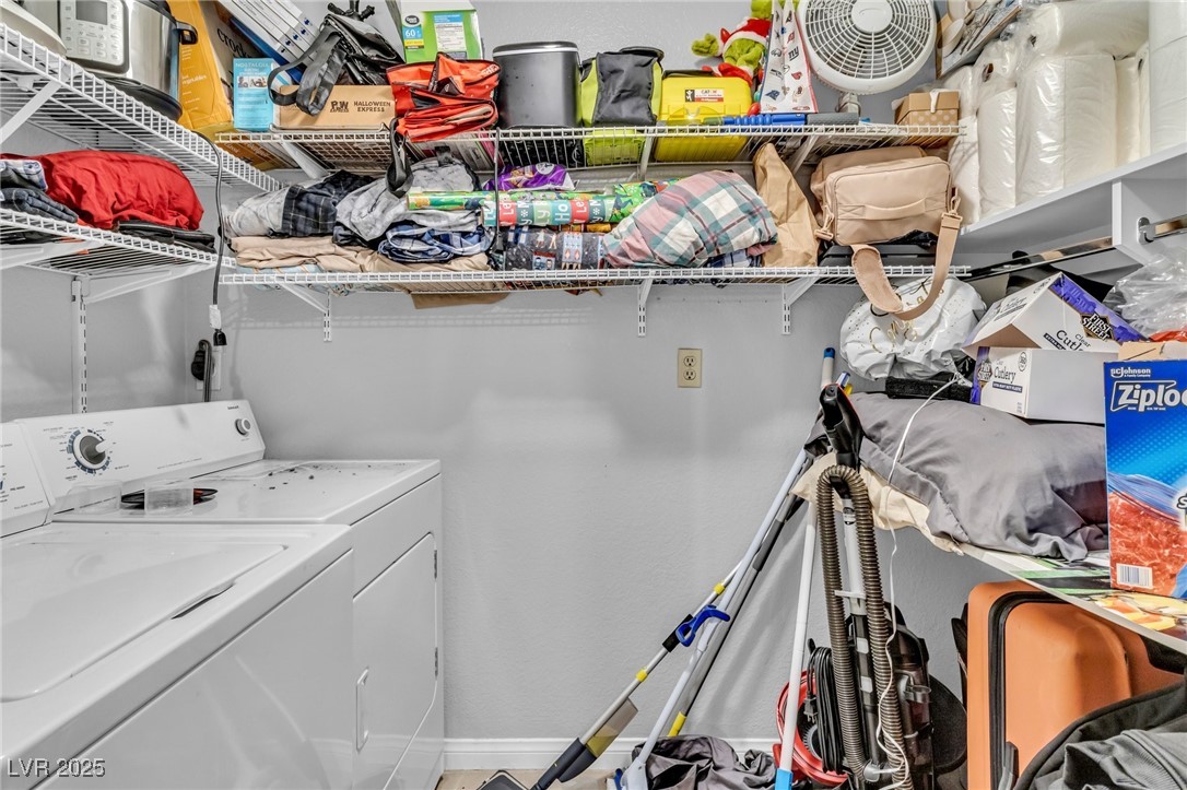 2200 South Fort Apache Road, Unit 1007 Las Vegas, NV 89117 - Photo 23 of 30 Laundry room with laundry area and washing machine and clothes dryer