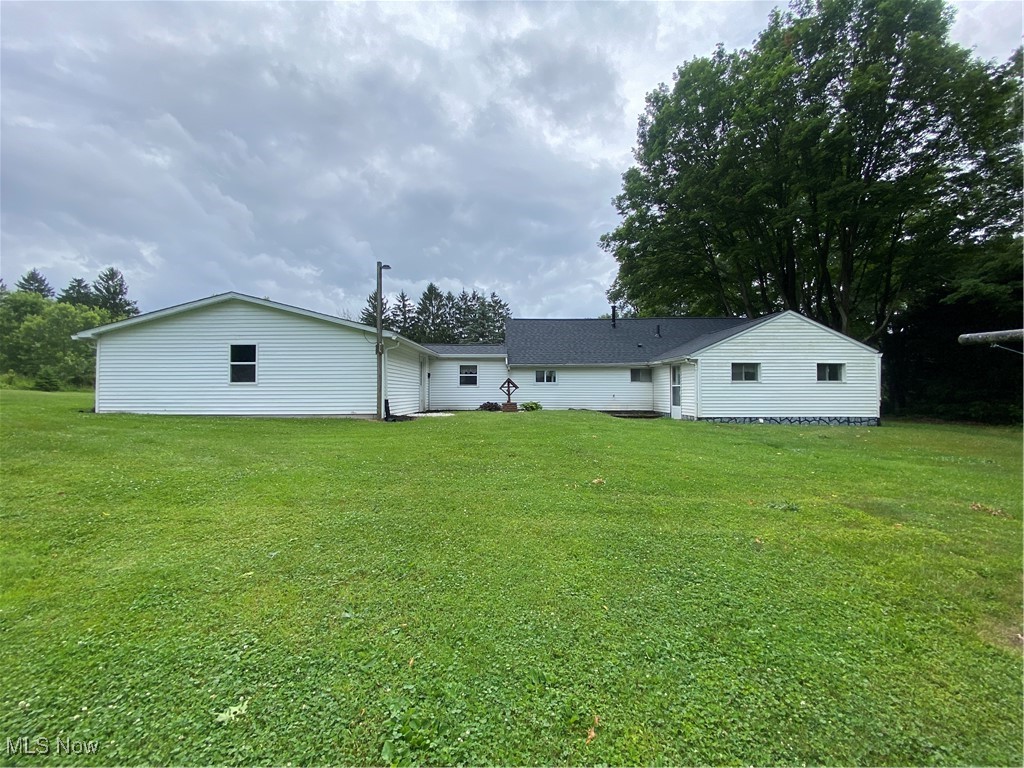 14092 Hatfield Road Rittman, OH 44270 - Photo 5 of 38 Back of property with a lawn