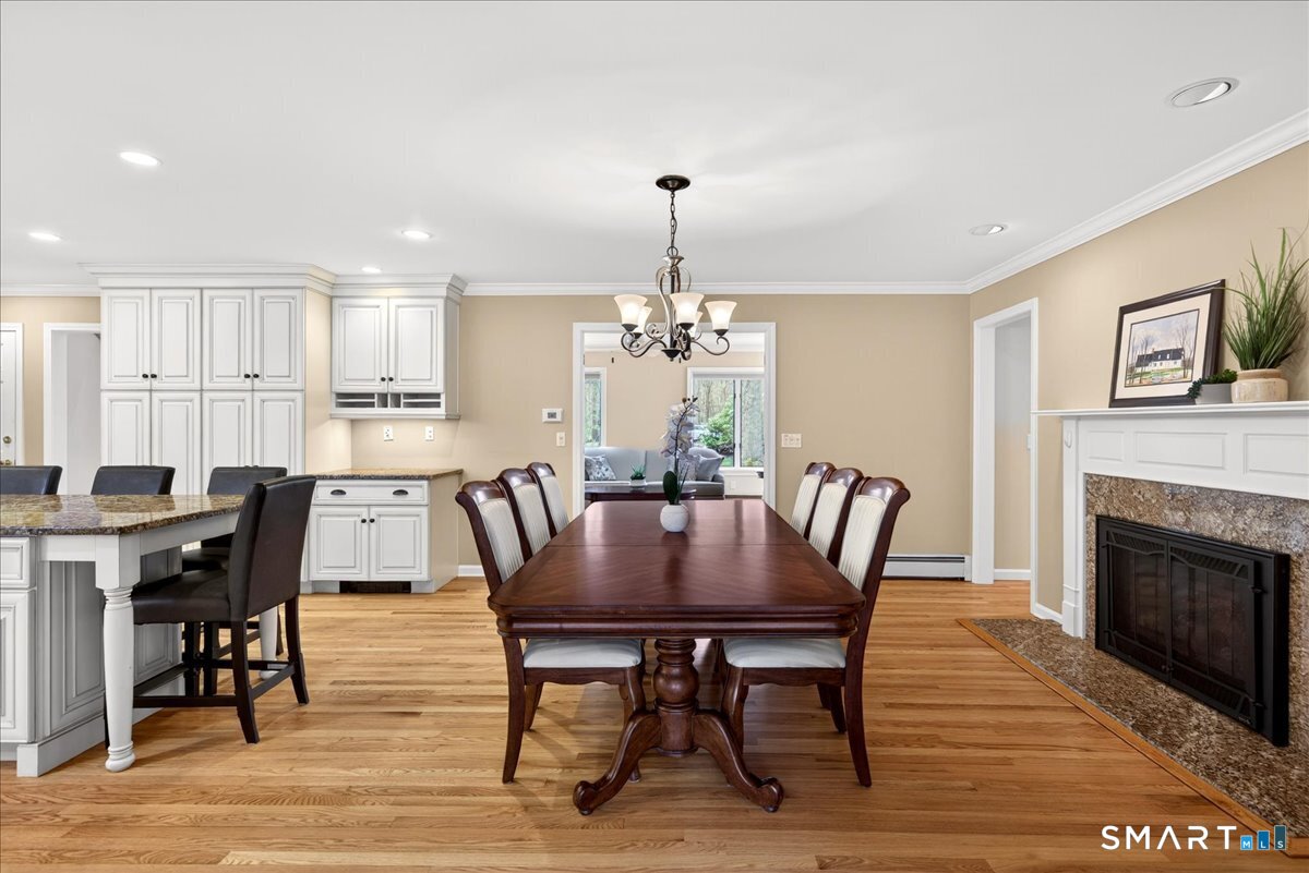 50 Overbrook Road Madison, CT 06443 - Photo 11 of 39 Dining Room with Gas Fireplace