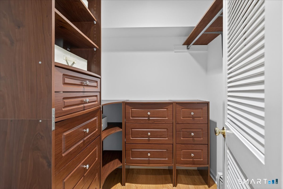 50 Overbrook Road Madison, CT 06443 - Photo 17 of 39 One of the two walk-in closets in primary suite