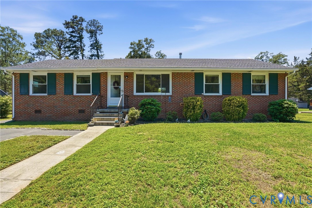 2403 Omega Road Henrico, VA 23228 - Photo 2 of 39 front view of a house with a yard