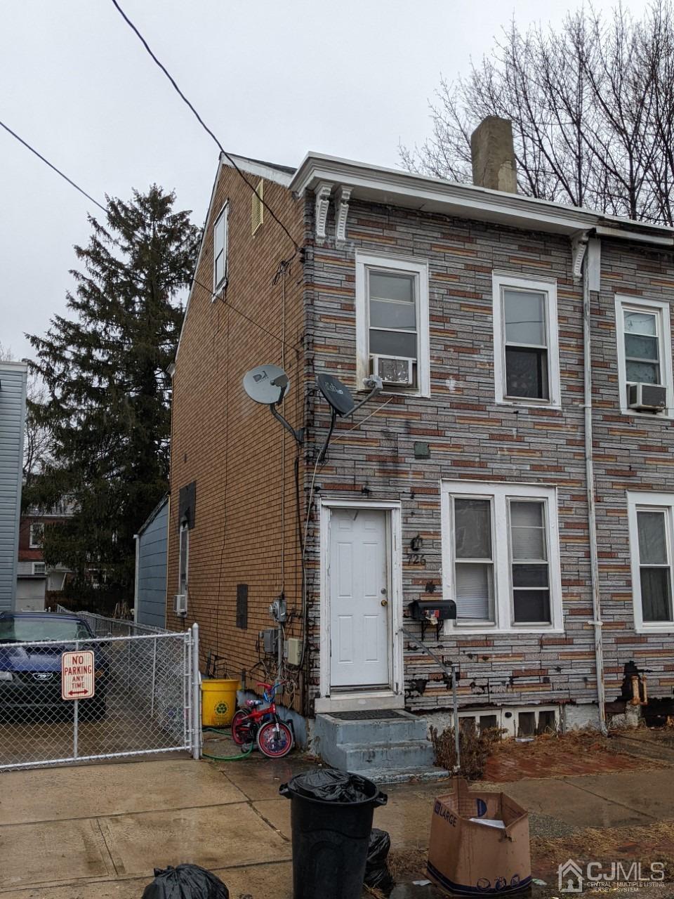 726 Genesee Street Trenton, NJ 08611 - Photo 2 of 2 a front view of a house with sitting area