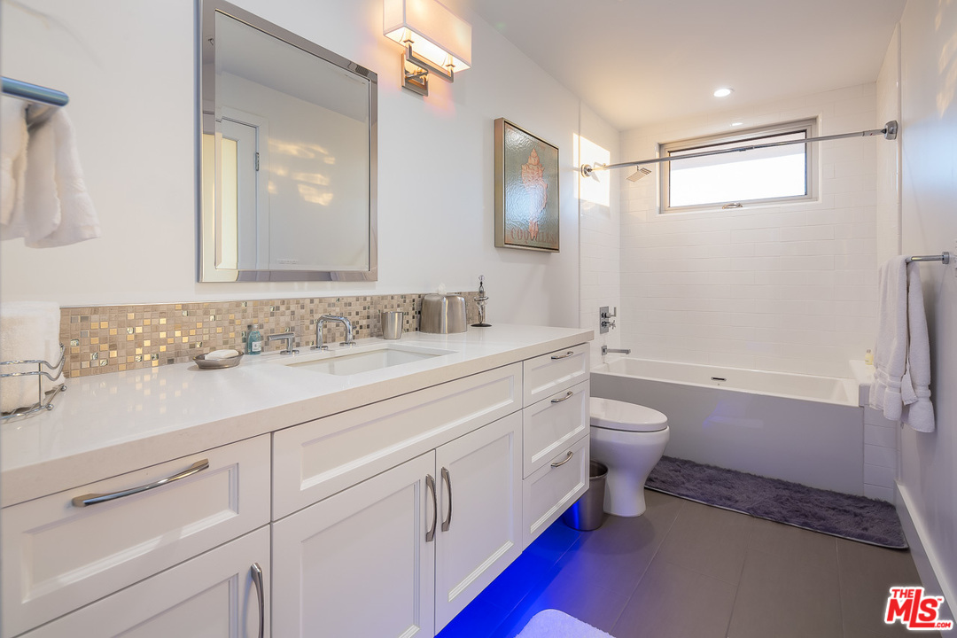 31528 Broad Beach Road Malibu, CA 90265 - Photo 26 of 26 a bathroom with a double vanity sink mirror and toilet