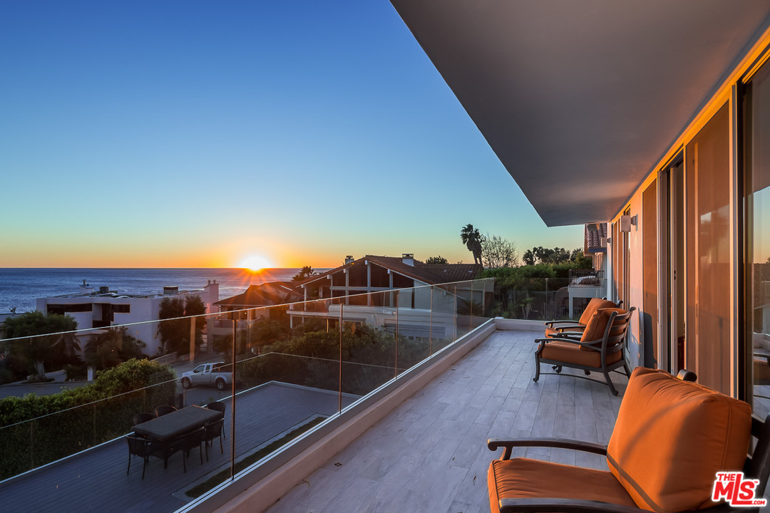 31528 Broad Beach Road Malibu, CA 90265 - Photo 6 of 26 a view of a balcony with chairs