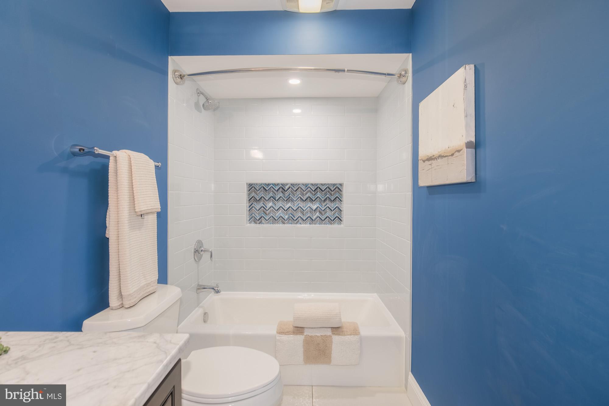 3803 10th Street Northwest, Unit 1 Washington, DC 20011 - Photo 48 of 71 a bathroom with a sink a toilet and shower